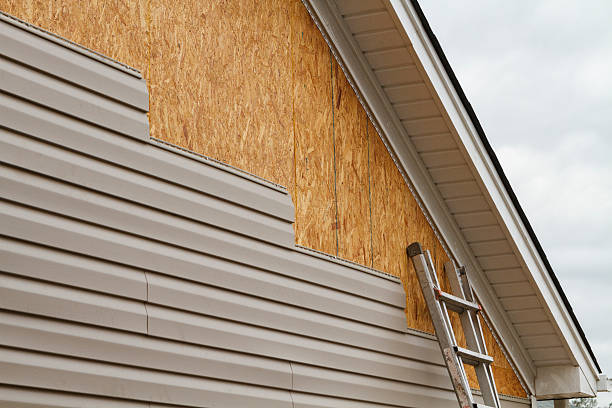Professional Emergency Siding Repair technician working in Barco, NC